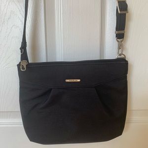 Travelon anti-theft black/pink cross body sling